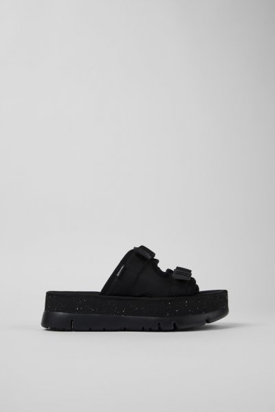 Camper Oruga Up - Mules negros de tela para mujer.