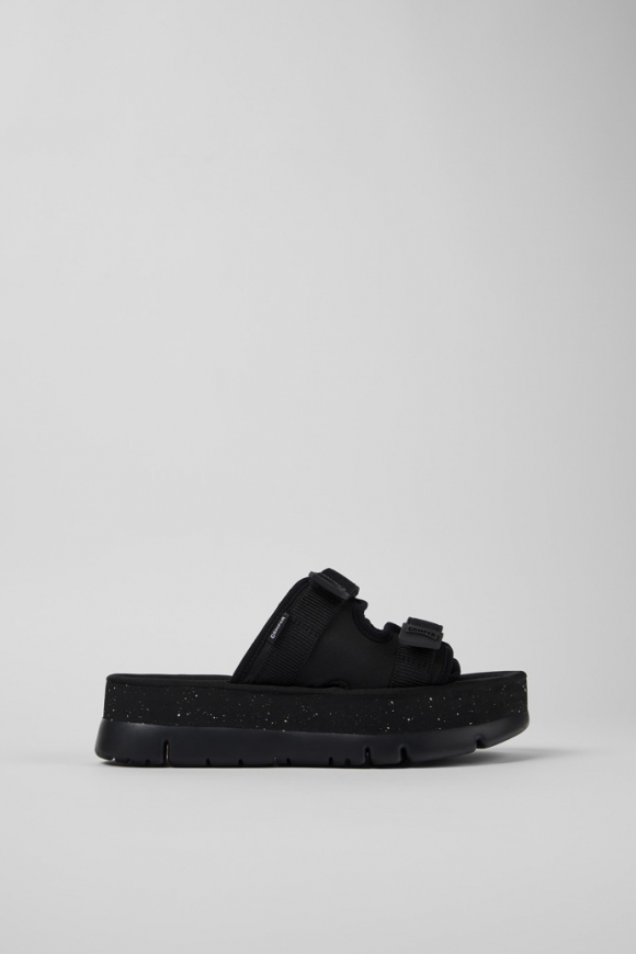 Camper Oruga Up - Mules negros de tela para mujer.