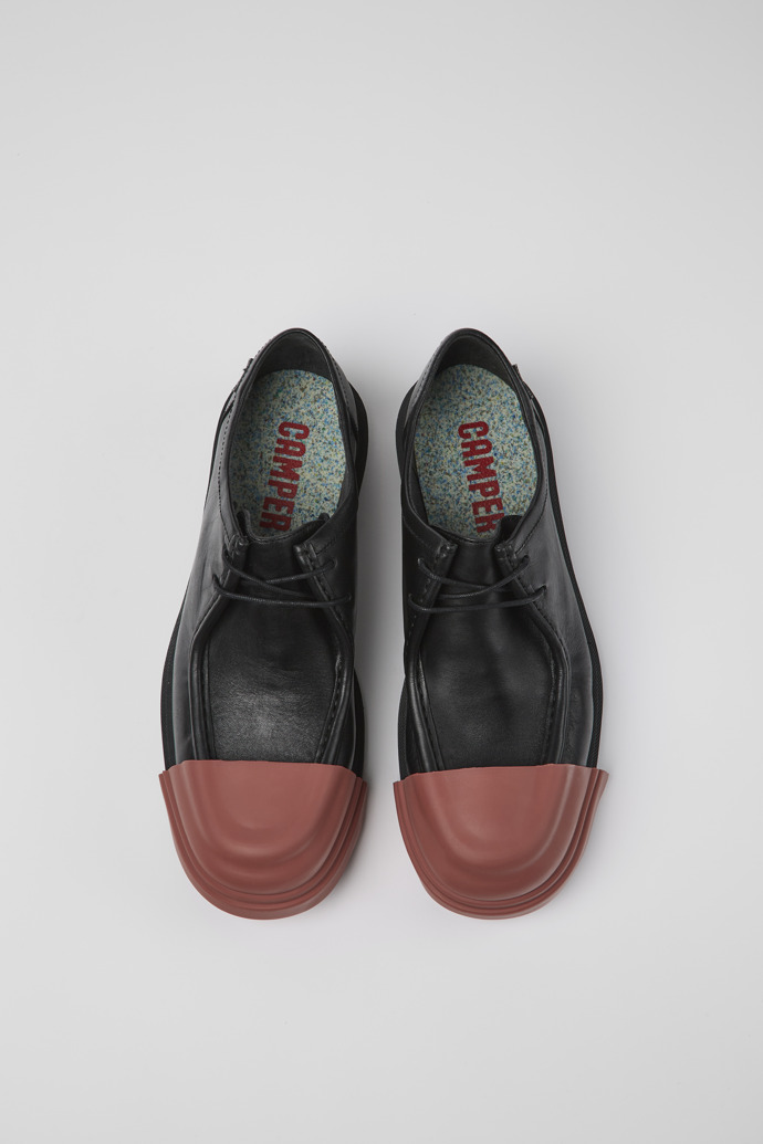 Camper Junction - Zapato Wallabee de piel negra para hombre.