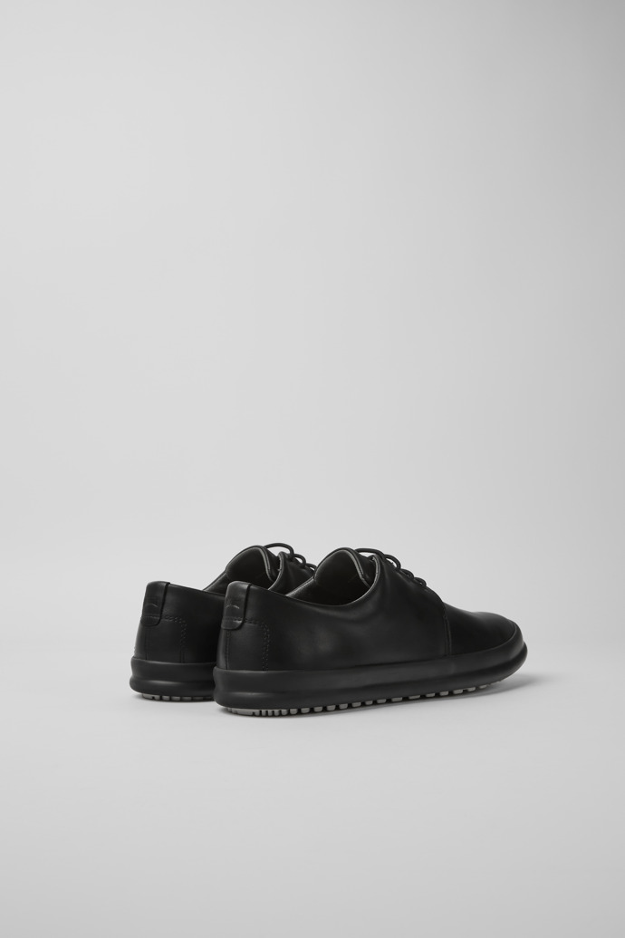 Camper Chasis - Zapatillas de piel negras para hombre.