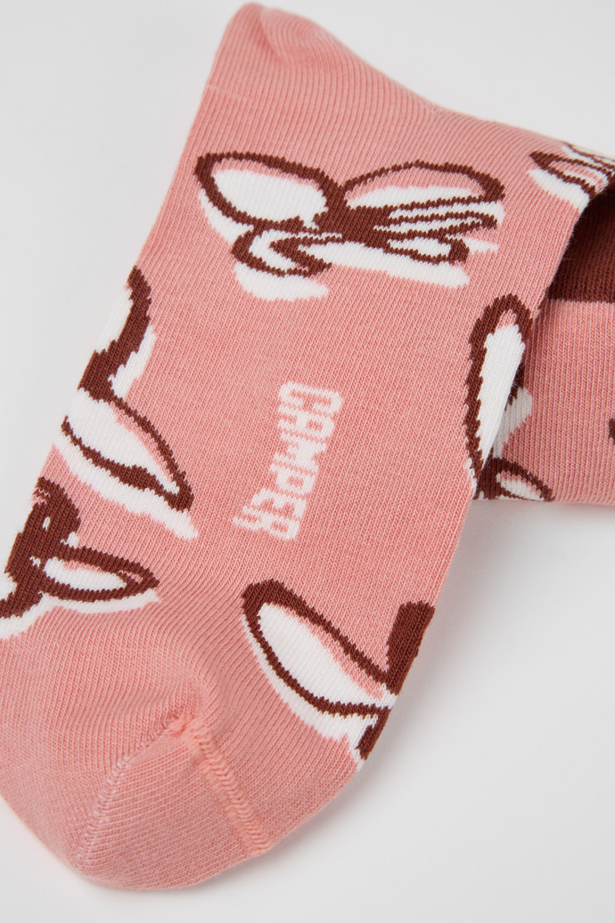 Camper Socks - Calcetines de algodón orgánico rosas y blancos con estampado rojo.